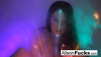 Alison Tyler, A Busty Beauty, Dances Seductively In Front Of A Disco Ball