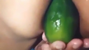 Stepmother Flaunts Her Open Ass While Pleasuring Herself With A Large Cucumber