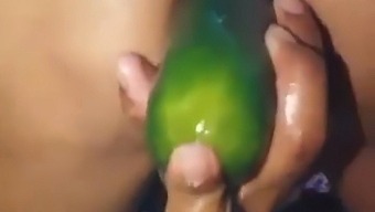 Stepmother Flaunts Her Open Ass While Pleasuring Herself With A Large Cucumber