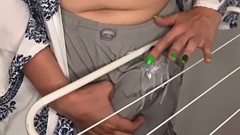 Step-Mom'S Solo Show Of Her Big Tits And Huge Cock On Laundry Day